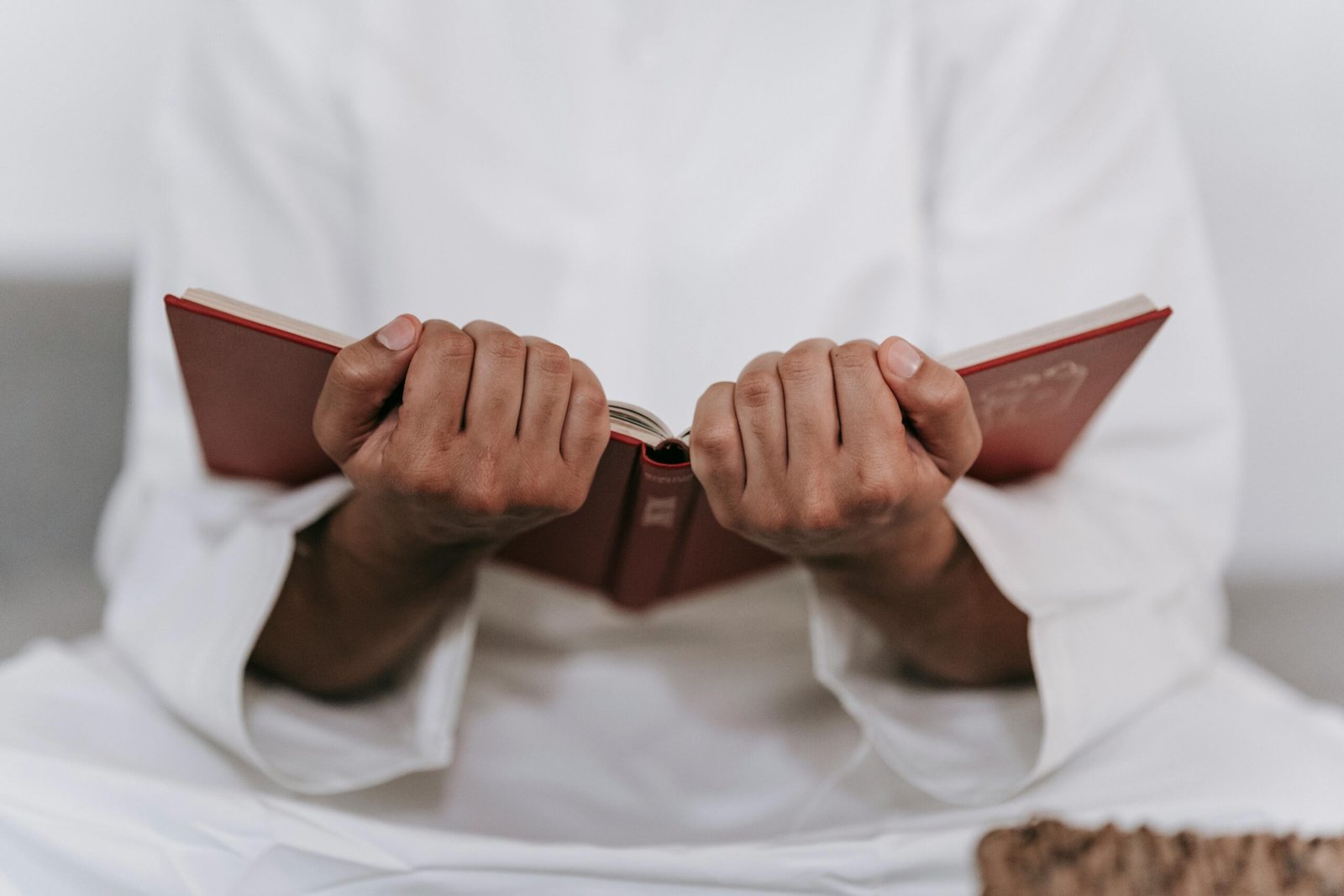islamic-concept-holy-al-quran-with-written-arabic-calligraphy-meaning-al-quran